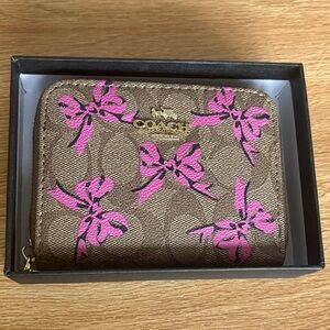 Coach Brown Wallet with Pink Bow Accents